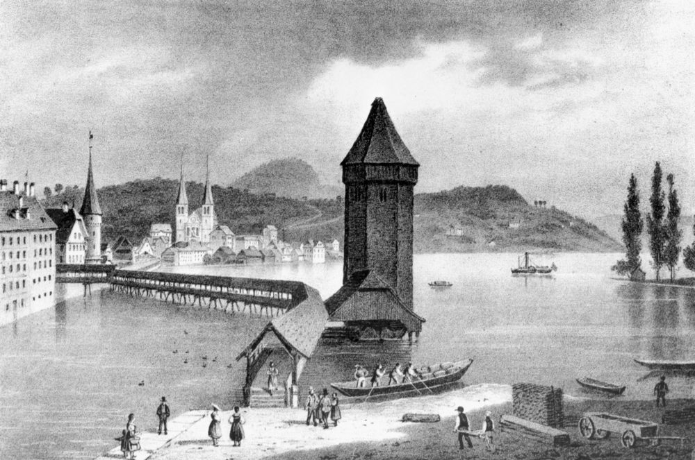 Nahe beim Wasserturm sind ungefähr 1835 die Aufschüttungsarbeiten am linken Reussufer in vollem Gang. Die ersten Spaziergänger nutzen den neuen Quai.